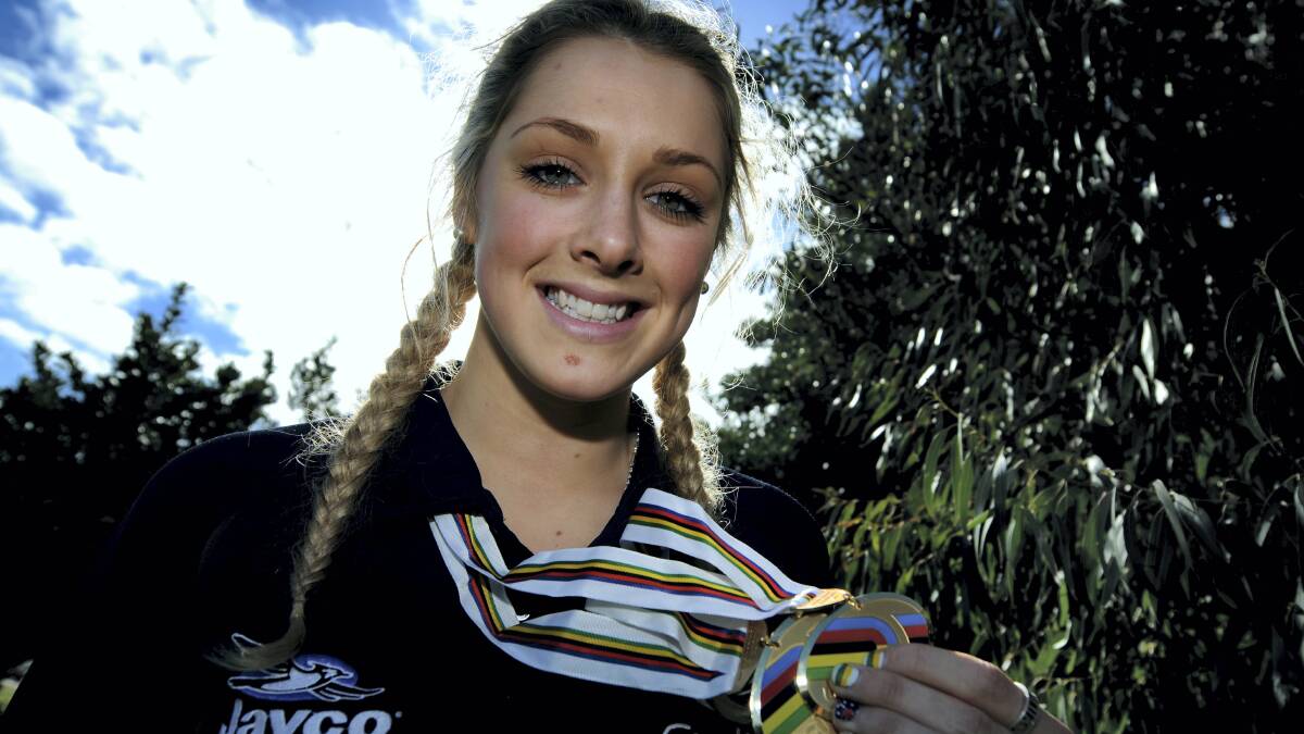 Macey Stewart with her medals n Devonport yesterday.