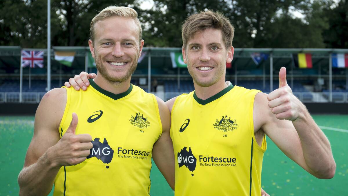 IT was all smiles for Tasmanian duo Eddie Ockenden and Tim Deavin after the Kookaburras snatched the World Hockey League Semi-Final tournament from Belgium in the dying moments of the tournament final.