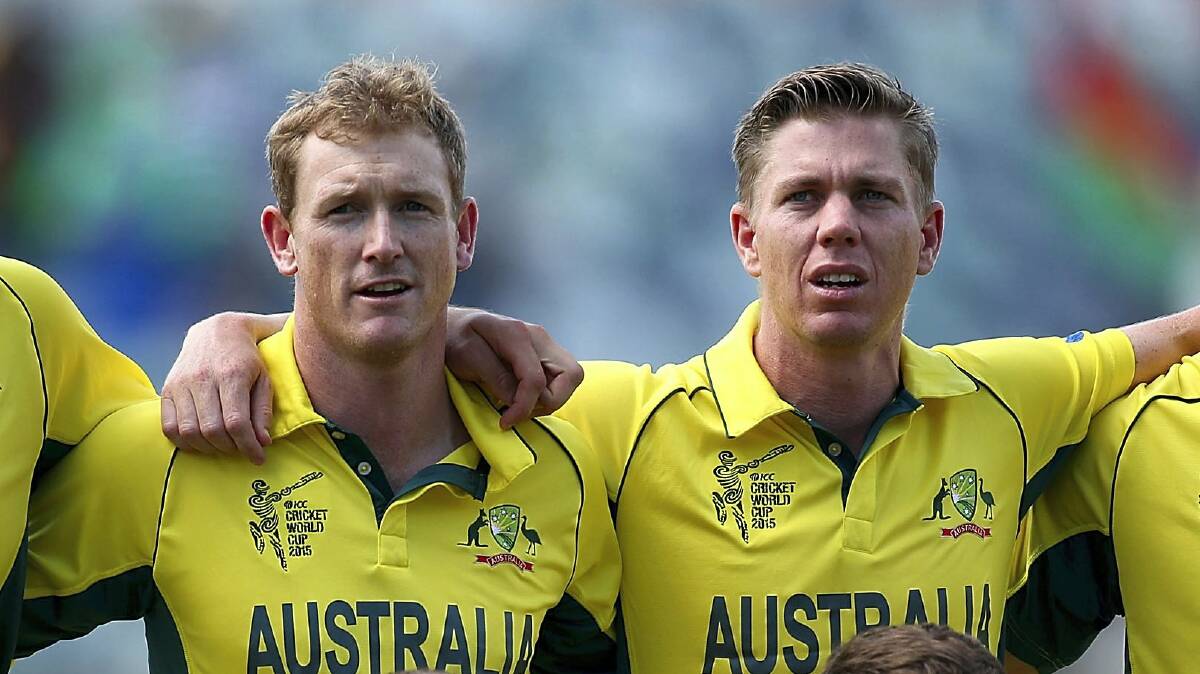 Tasmanians George Bailey and Xavier Doherty sing the Australian national anthem before the World Cup match against Afghanistan.  Picture: GETTY IMAGES 
