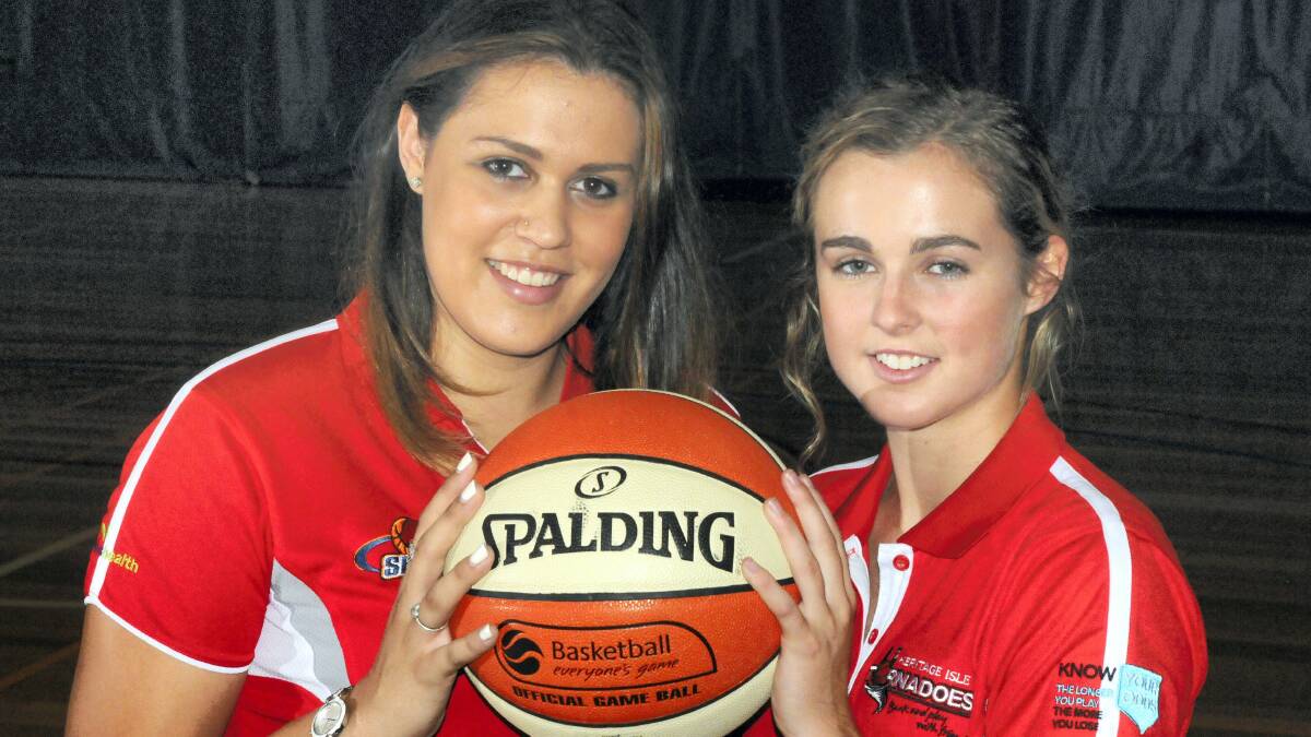 Tornadoes teammates Alex Wilson  and Edwina Kidd are ready to take on the Hobart Lady Chargers on Saturday night. Picture: PAUL SCAMBLER