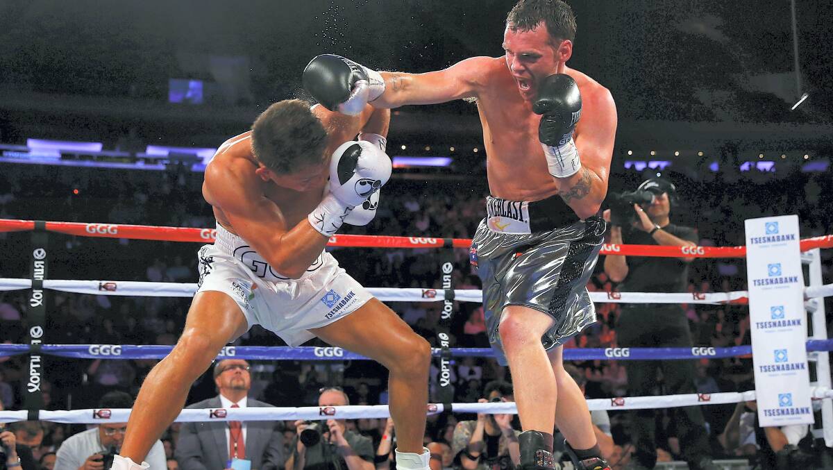 Daniel Geale lands a punch against champion Gennady Golovkin.
Picture: Getty