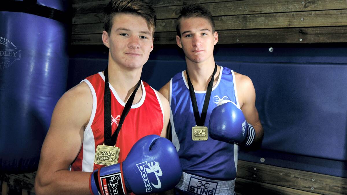 Bailey, 16,  and 17-year-old Jack Seabourne,  of Launceston, with their Australian Boxing Championships gold medals.  Picture: GEOFF ROBSON