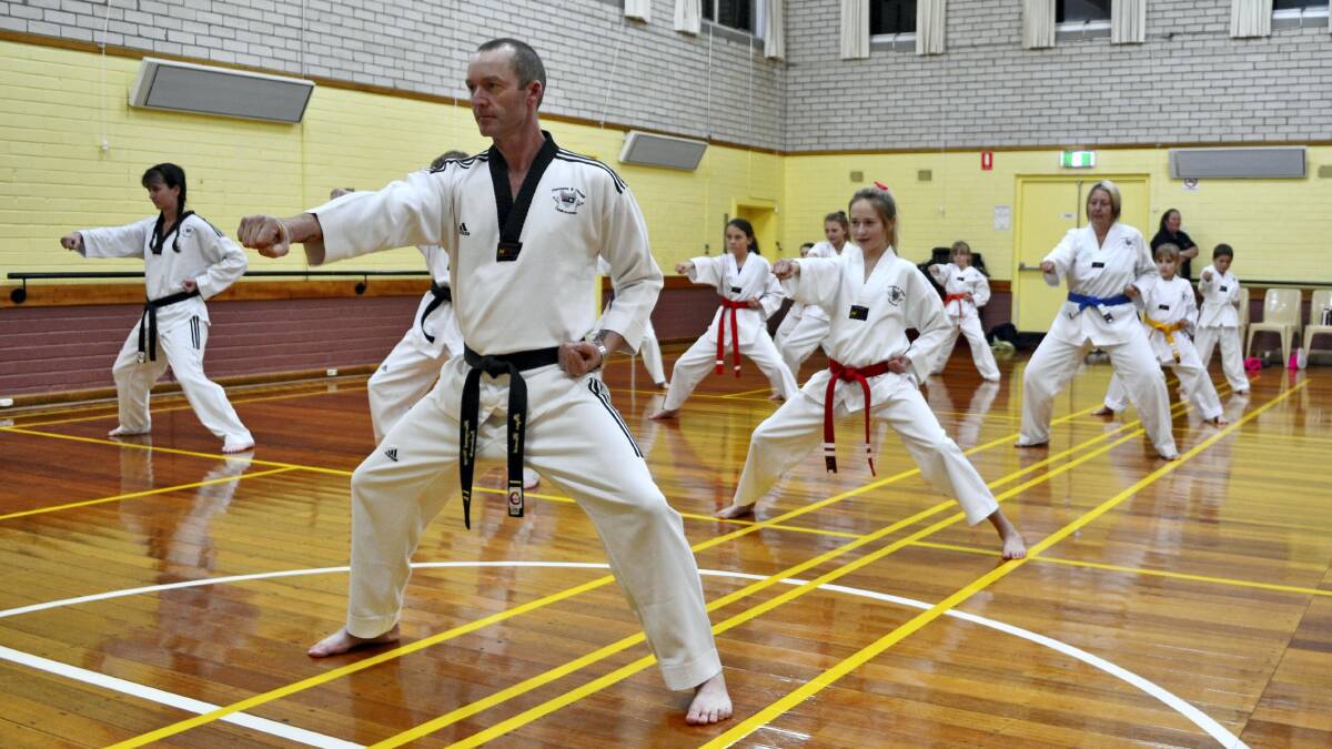Flanagan and Chugg Taekwondo instructor Roger Howard is fund-raising with his Evandale class to compete at an international level in Sydney.