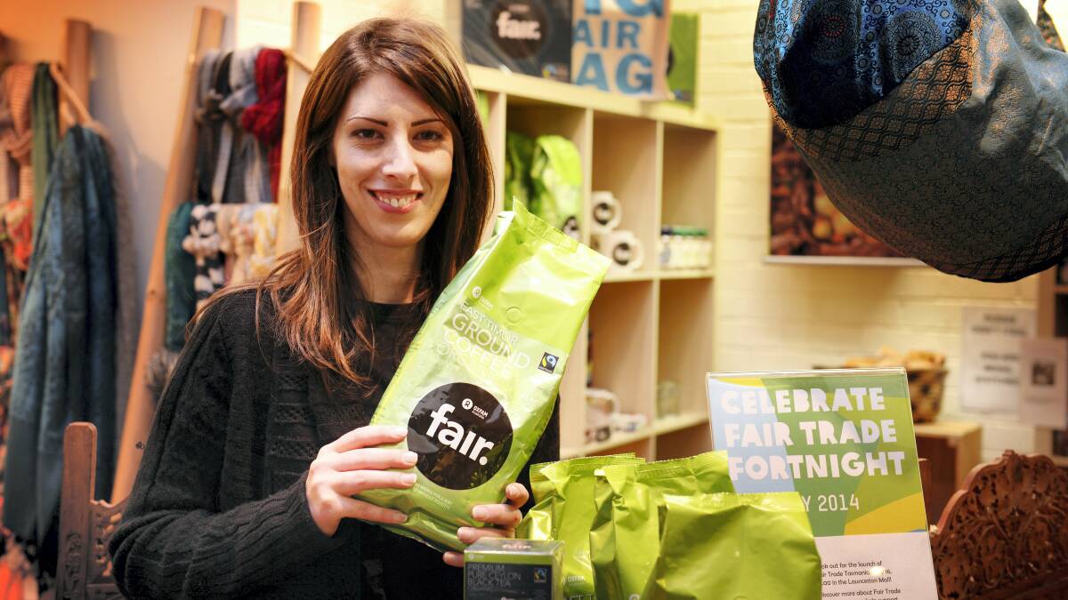 Launceston Oxfam shop manager Amanda Dewis with Fair Trade coffee. Picture: PAUL SCAMBLER