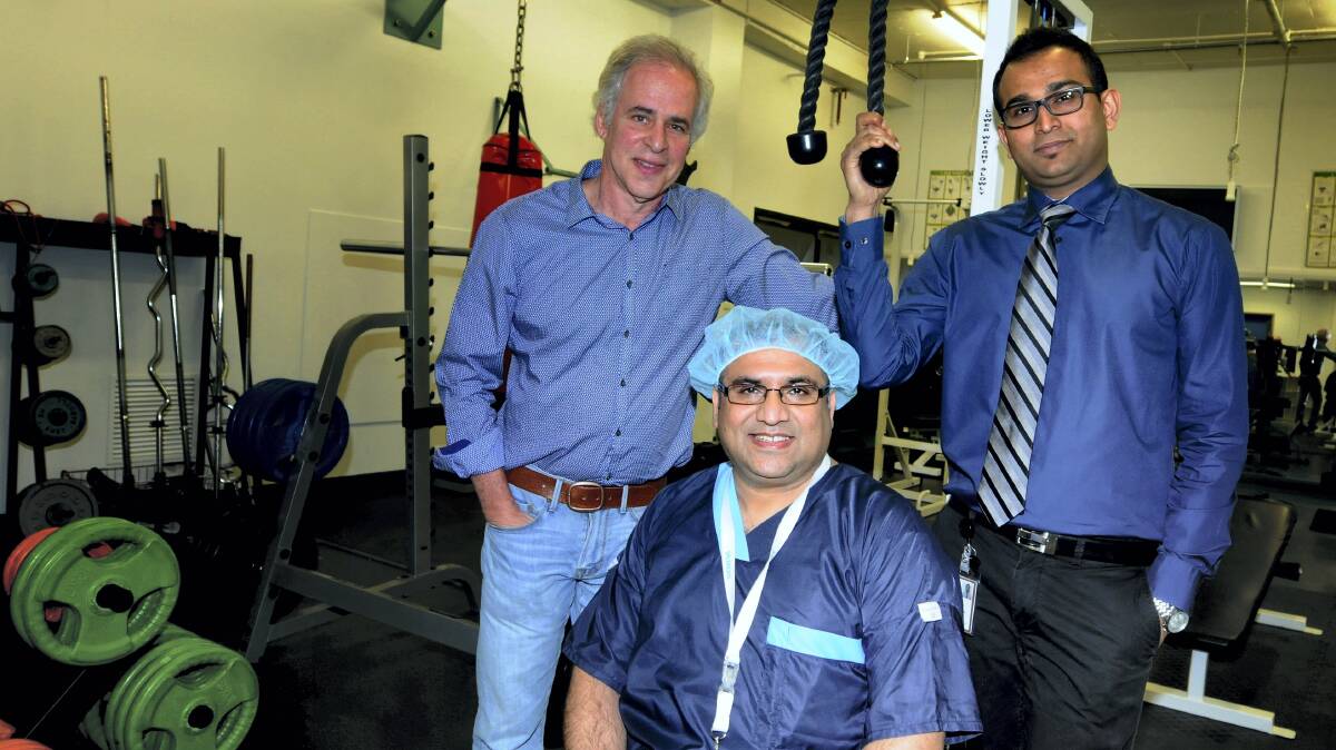 Launceston General Hospital cardiologists Brian Herman  and Inaam Ullah with Vivek Gupta, who is an  advanced trainee in  cardiology. Picture: GEOFF RONSON