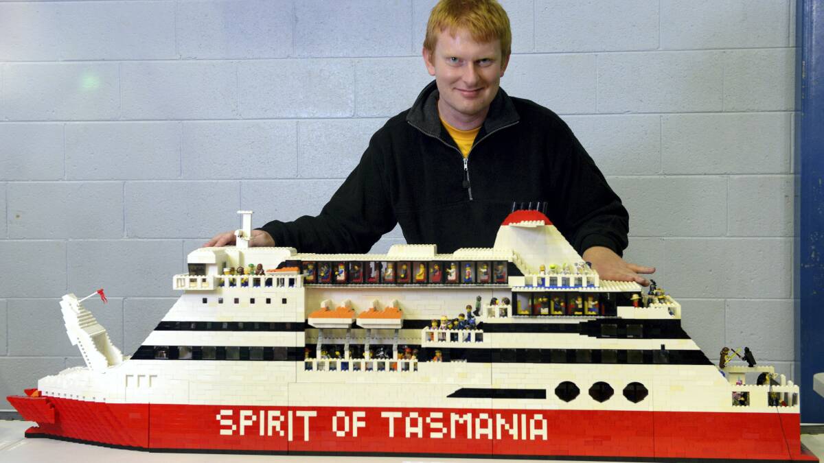Aaron Parker with his Lego model of the Spirit of Tasmania. Picture: MARK JESSER