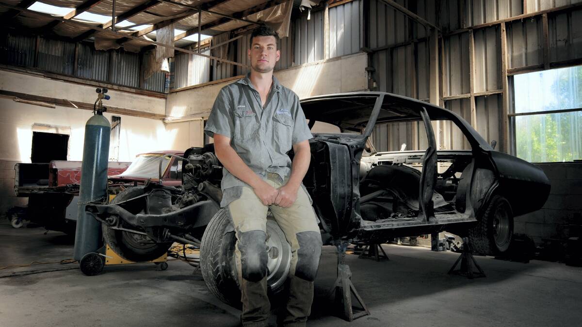 Deloraine’s Nathan Purton, 23, is running his own business restoring cars sometimes three times his age.Picture: GEOFF ROBSON