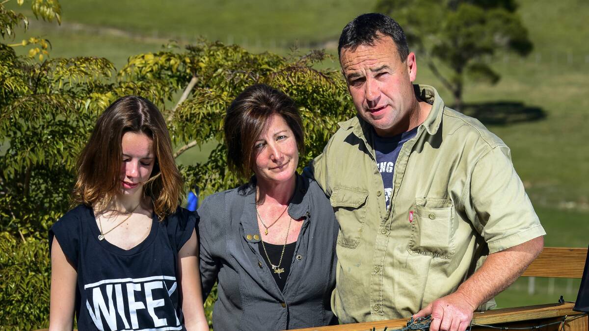 Sister Taylar and parents Lisa and Peter Goss, of Sidmouth, recall stories of Brittany, who was struck and killed by a car after alighting from a bus near their home.  Picture: PHILLIP BIGGS