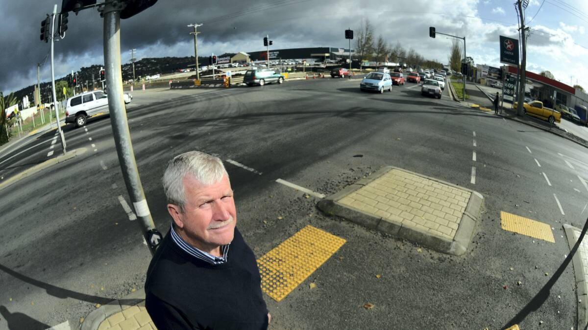 Launceston Alderman Ted Sands crossing at the Lindsay and Goderich streets intersection near the new Invermay Bunnings ... traffic flow concerns have been raised as the city's busiest intersection prepares to get busier. Picture: PAUL SCAMBLER
