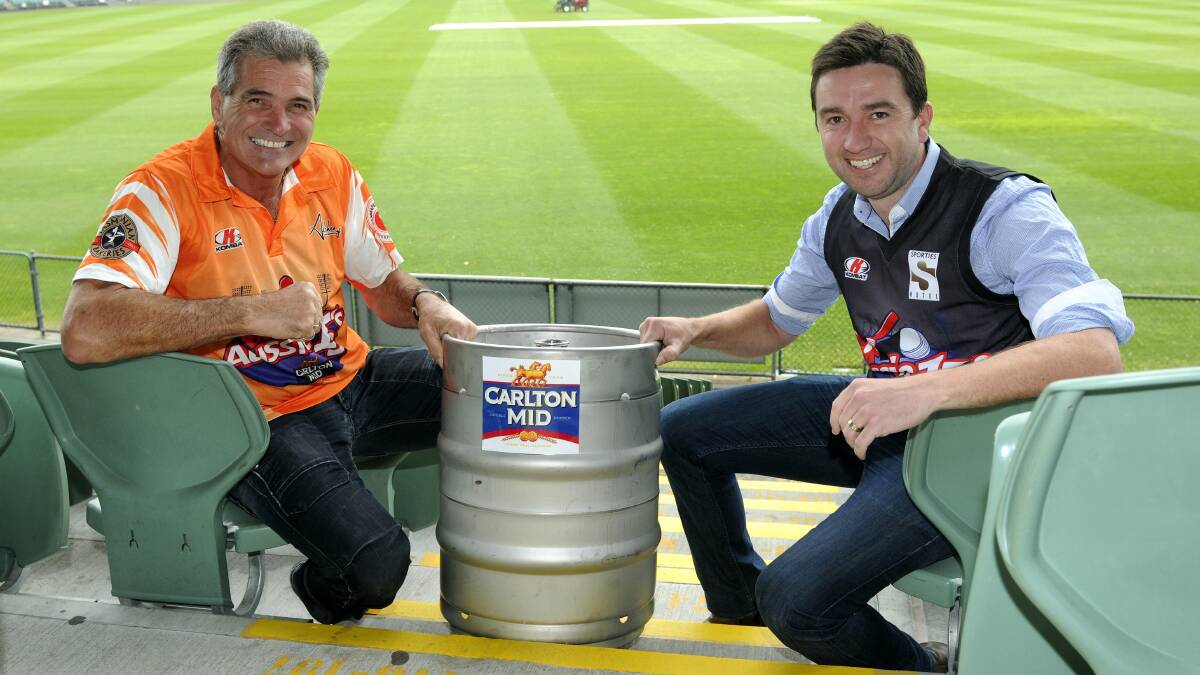 Alchemy owner Ralph Norton and Sporties owner Nick Daking with the keg of beer that is the subject of a bet between the two men at this weekend’s opening round of the Aussie 15s. Picture: PAUL SCAMBLER