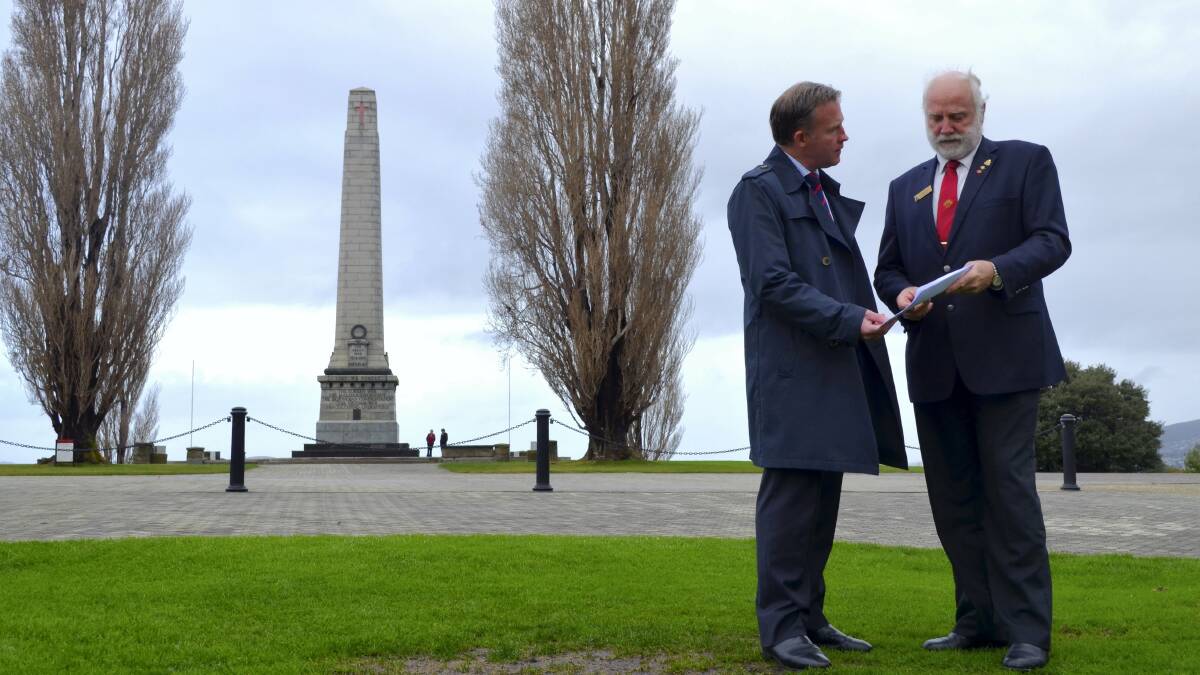 Premier Will Hodgman and RSL Tasmanian president Robert Dick at the Hobart Cenotaph announcing a Flame of Remembrance will be in place by Anzac Day. Picture: ROSEMARY BOLGER