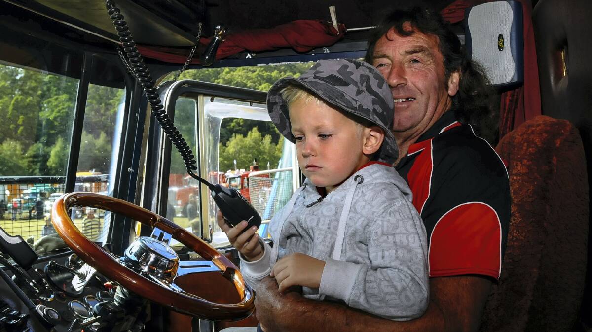 Zavier MacDonald, 4, of Ravenswood, and truck driver Andrew Flynn, of Turners Marsh, at Myrtle Park. Picture: NEIL RICHARDSON