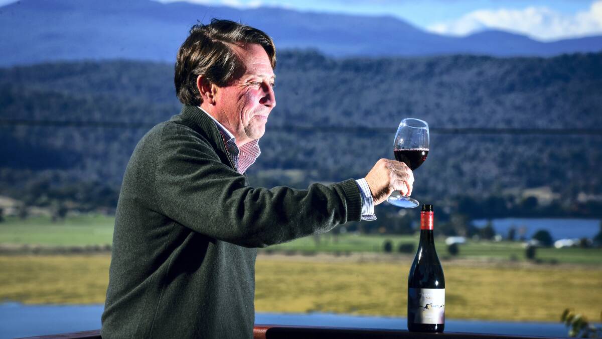 Tamar Ridge Wines owner Will Adkins with a local drop. Tourists have been  flocking to the region recently. Picture: PHILLIP BIGGS