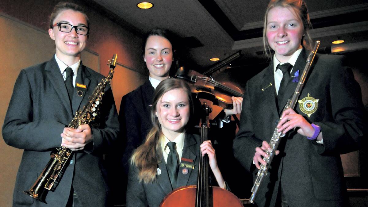 Georgina Perkins, 18, of St Patrick’s College, Sophie Green, 17, of St Patrick’s College, Meredith Hodson, 17, of Scotch Oakburn College, and Libby McTique, 15, of St Patrick’s College, preparing for the weekend’s St Cecilia School of Music Performance Challenge.  Picture: GEOFF ROBSON
