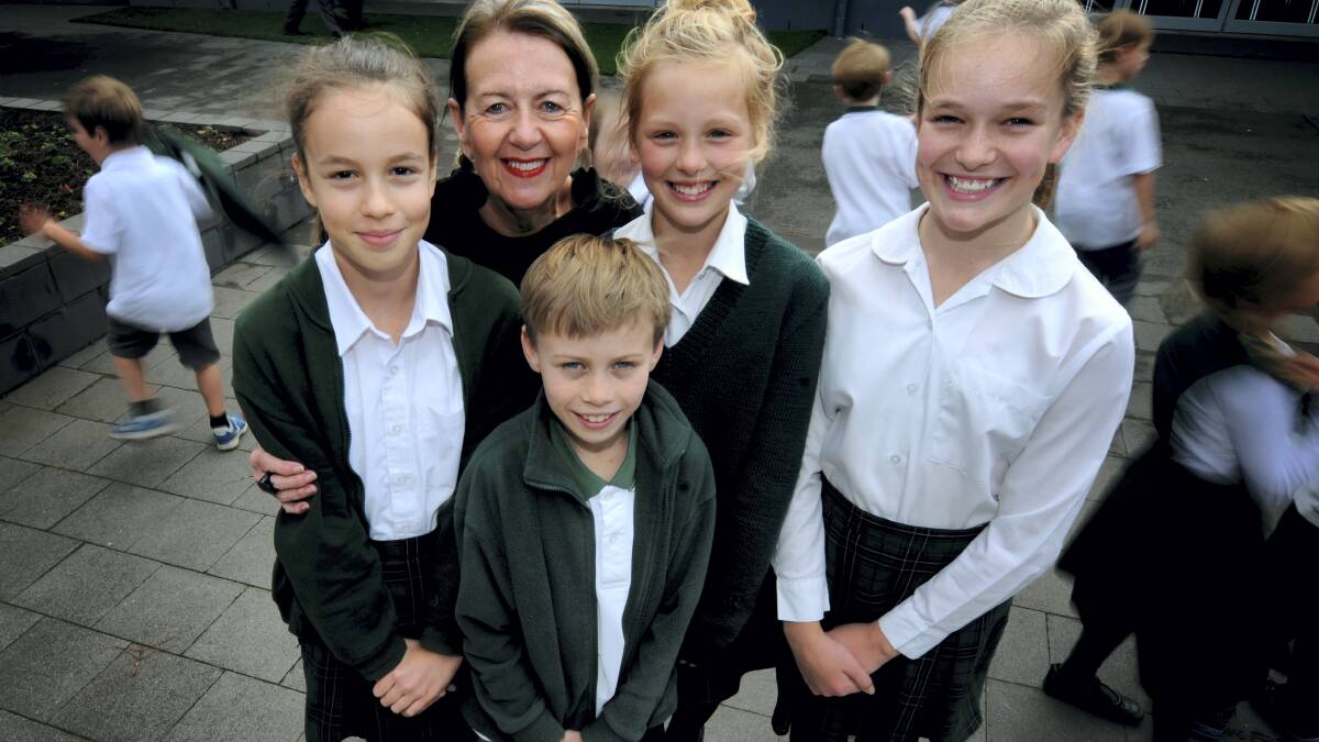Retiring East Launceston Primary School teacher Judy Pill with pupils Holiday Holcombe-James, Benjamin Hill, Sassafras Thomas,  and Laura Dickinson, all 11. Picture: GEOFF ROBSON