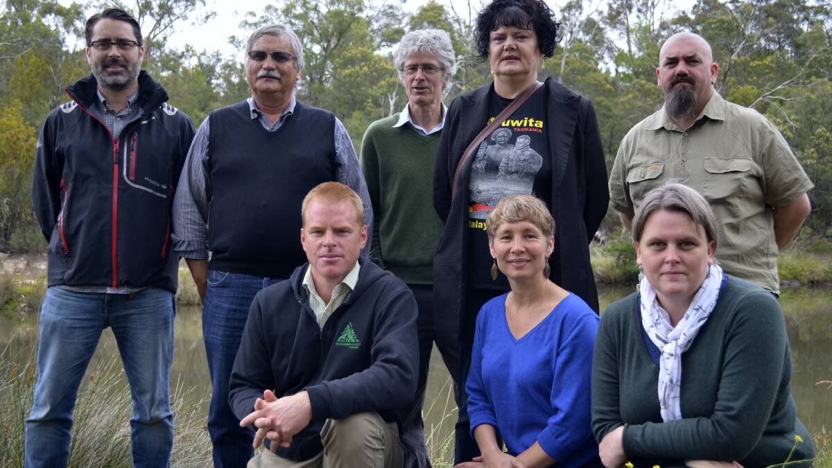 BACK: Andrew Perry, of Environment Tasmania, Clyde Mansell, of the Aboriginal Land Council of Tasmania, Peter McGlone, of the Tasmanian Conservation Trust, Trudy Maluga, of the Tasmanian Aboriginal Centre, and Save the Tarkine’s Scott Jordan. FRONT: The Wilderness Society’s Vica Bayley, Ruth Langford, of the Tasmanian Aboriginal Centre, and Jenny Weber, of the Bob Brown Foundation.