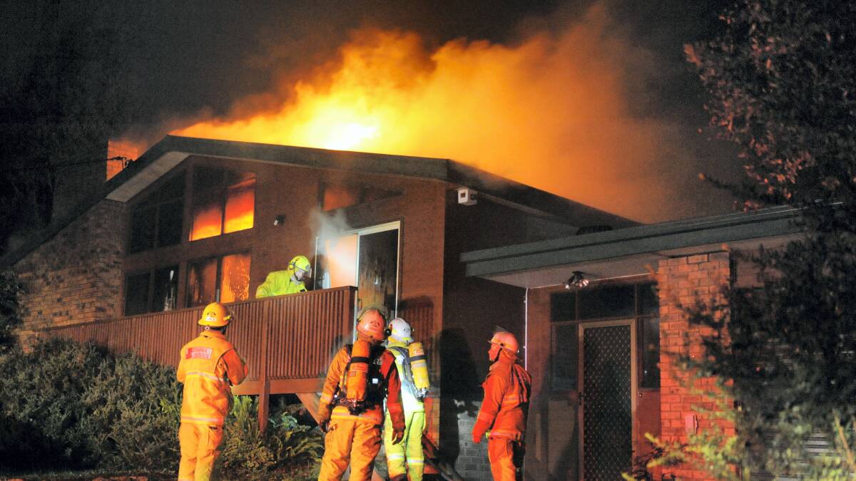 Tasmania Fire Service personnel at the scene of last night's fire in West Launceston. Picture: Mark Jesser