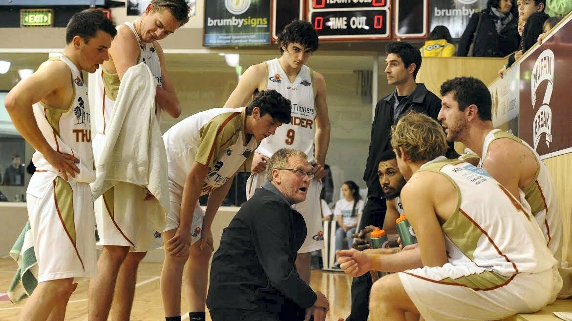 North-West Thunder coach Phil Thomas addresses his players during last week’s second semi-final. Picture: TREVOR JACKSON