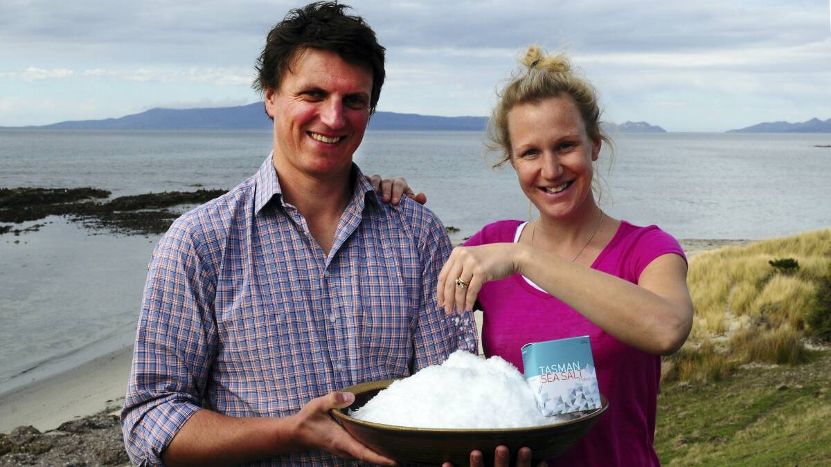 Tasman Sea Salt producers Chris Manson and Alice Laing with their product. Picture: NEIL RICHARDSON