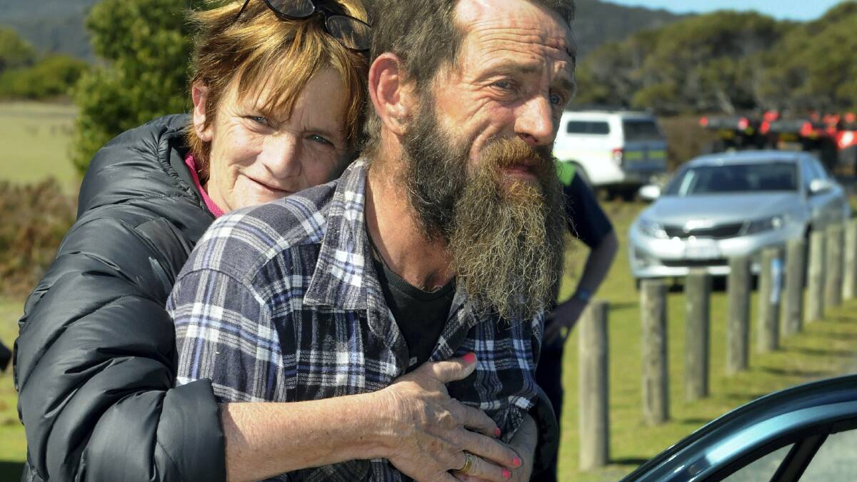 Tammy Williams, of Launceston, gives her brother John Norrish a hug after he  went missing for 24 hours. Picture: PAUL SCAMBLER