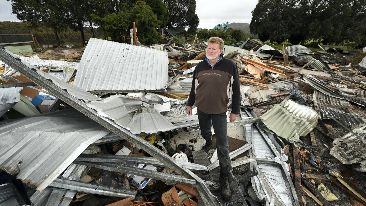 Lance Musgrave surveys the trail of damage at his Frankford property   after  vandals   broke into an excavator and  ran amok. Picture: MARK JESSER