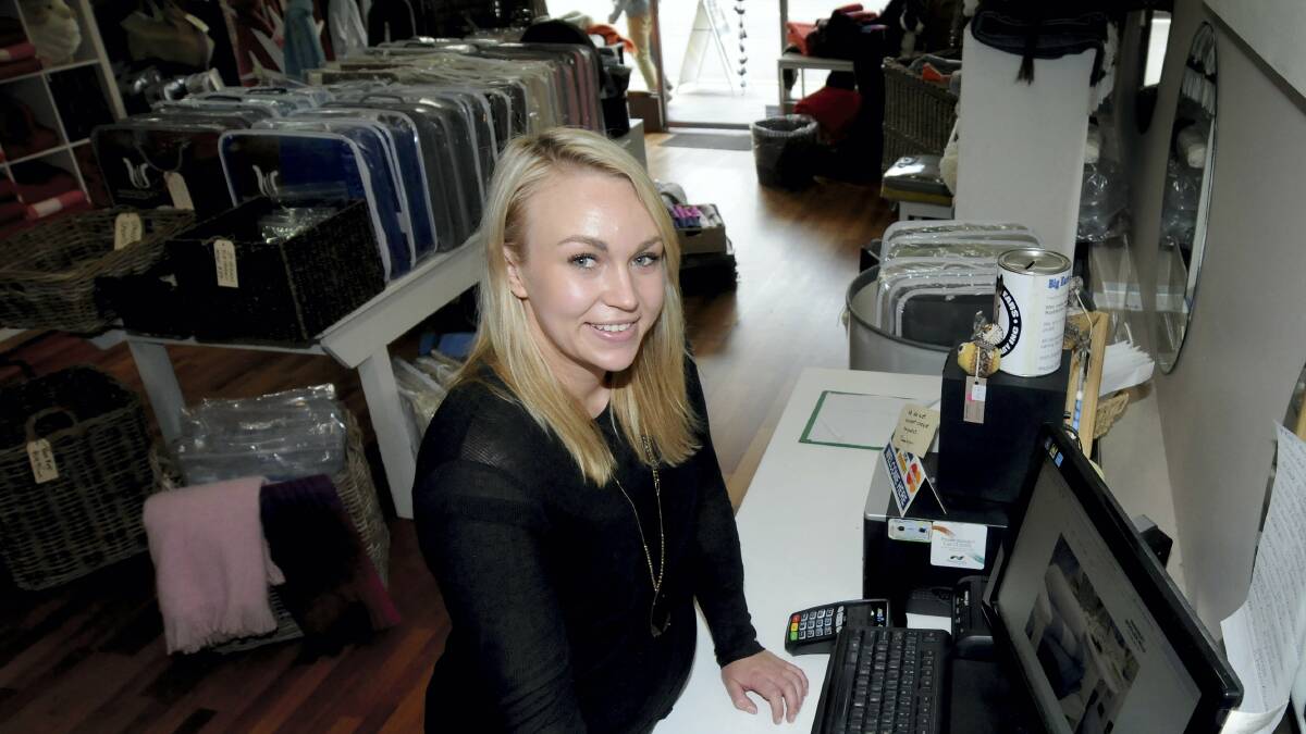 Waverley Woollen Mills Factory Outlet retail assistant Jenna Taylor. The company also has a busy  online store. Picture: GEOFF ROBSON