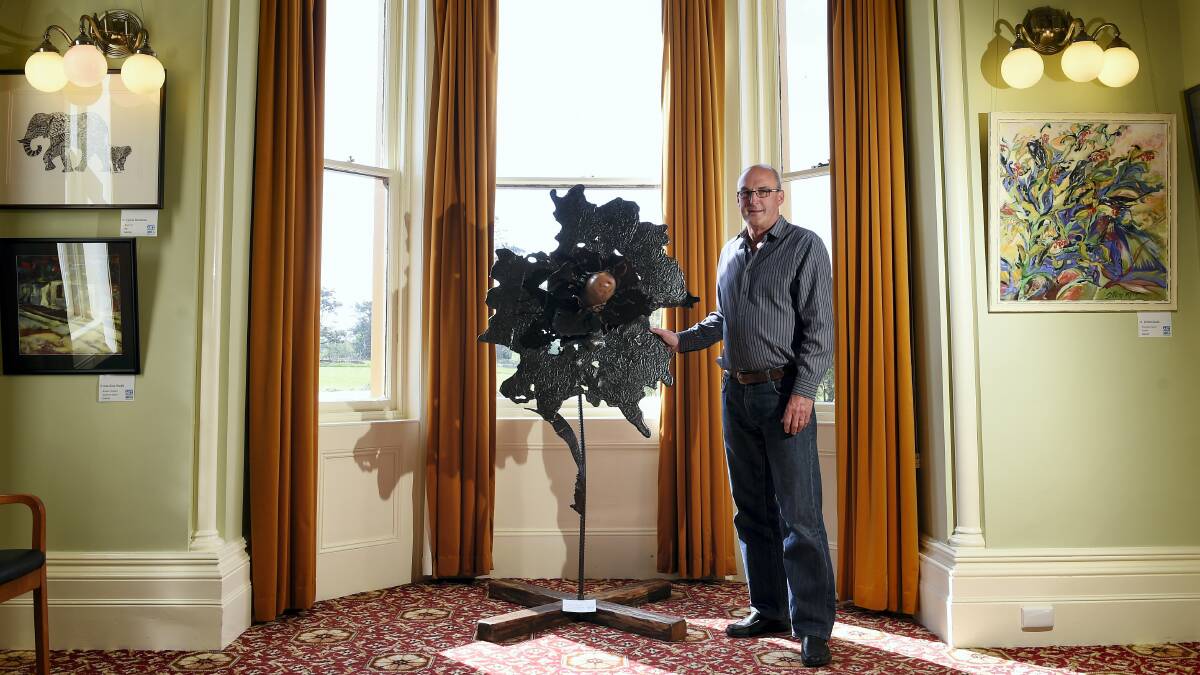 Eskleigh chief executive Dale Luttrell with one of the sculptures on display at Eskleigh. Picture: MARK JESSER
