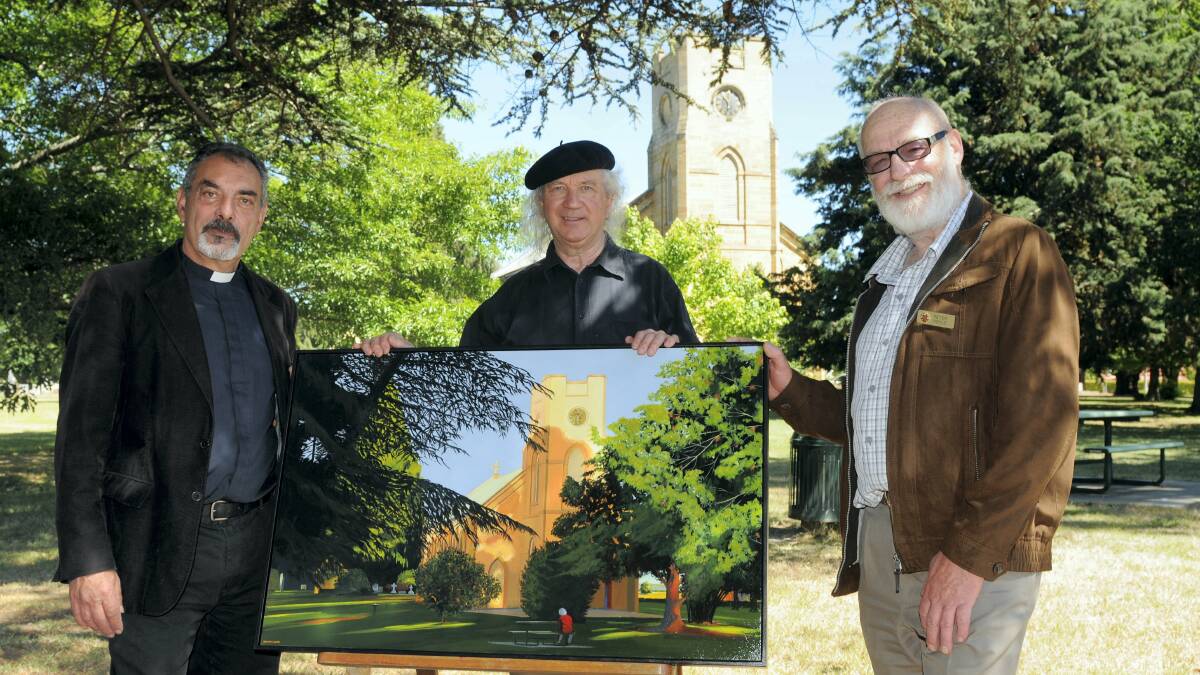Longford Christ Church Reverend Edrick Corban-Banks, artist David Lake and church warden Peter Hoyle display Lake’s painting. Picture: PAUL SCAMBLER