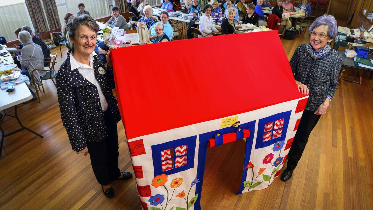 Embroiderers Guild of Tasmania president Mary Nye and secretary Joan North with an embroidered tent they are donating to the Launceston General Hospital’s children’s ward.  Picture: PHILLIP BIGGS