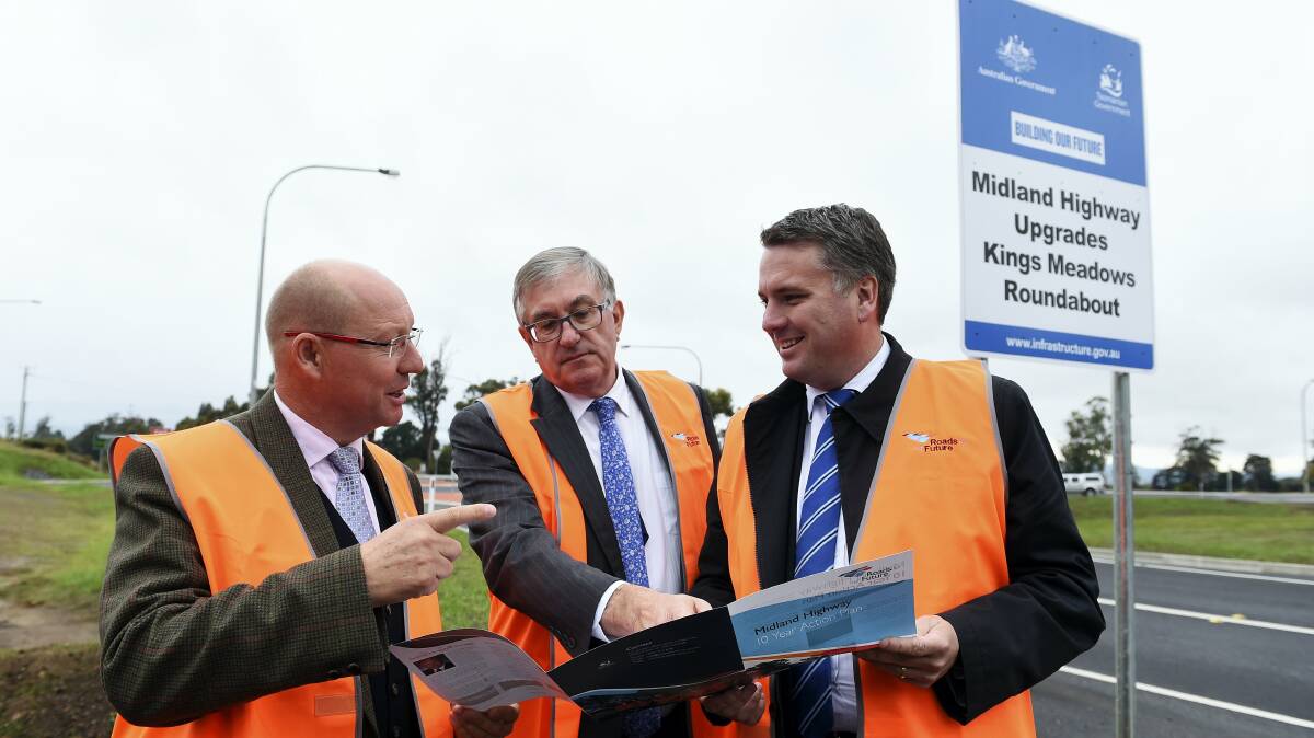  MP Eric Hutchinson, Tasmanian Infrastructure Minister Rene Hidding and  federal Assistant Infrastructure Minister Jamie Briggs. Picture: MARK JESSER