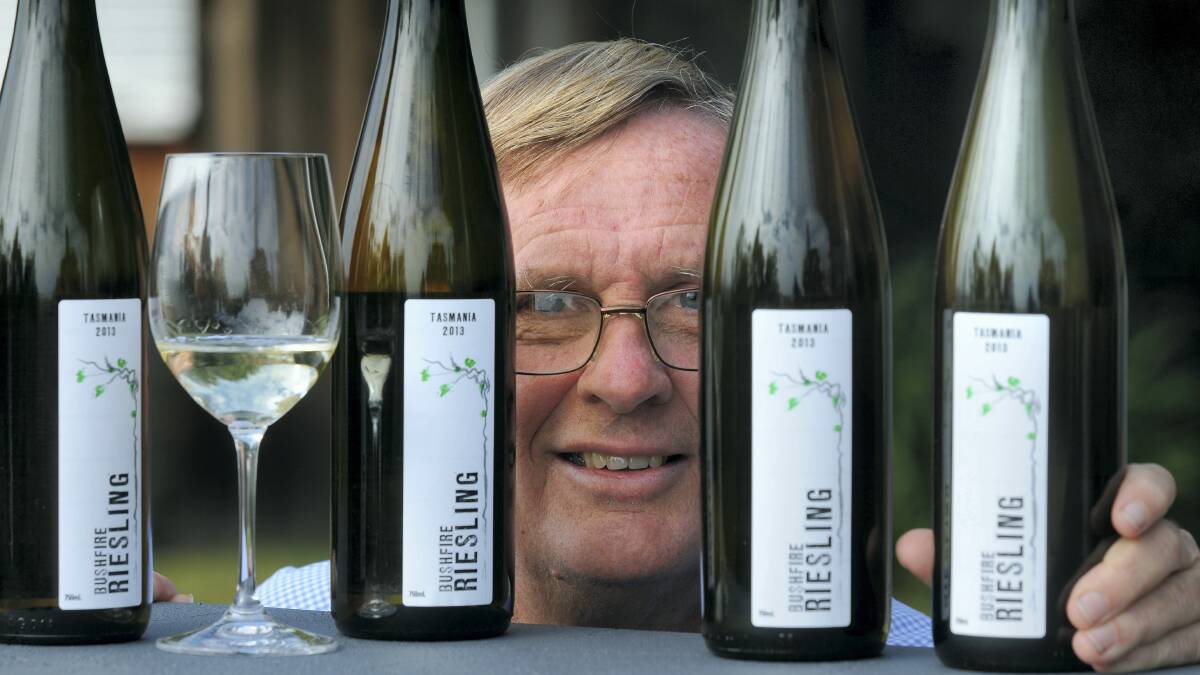 Steve Hyde, of Grindelwald, with some of the riesling donated to the Dunalley bushfire victims. Picture: PAUL SCAMBLER