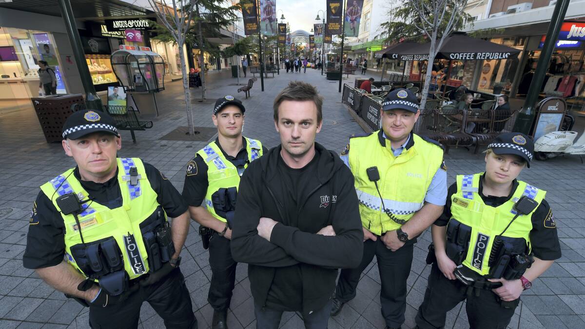 Wanted Streetwear owner Luke Dawson stands with Tasmania Police constables Simpson, Langshaw, Storay and Freeman-Finn. Picture: MARK JESSER