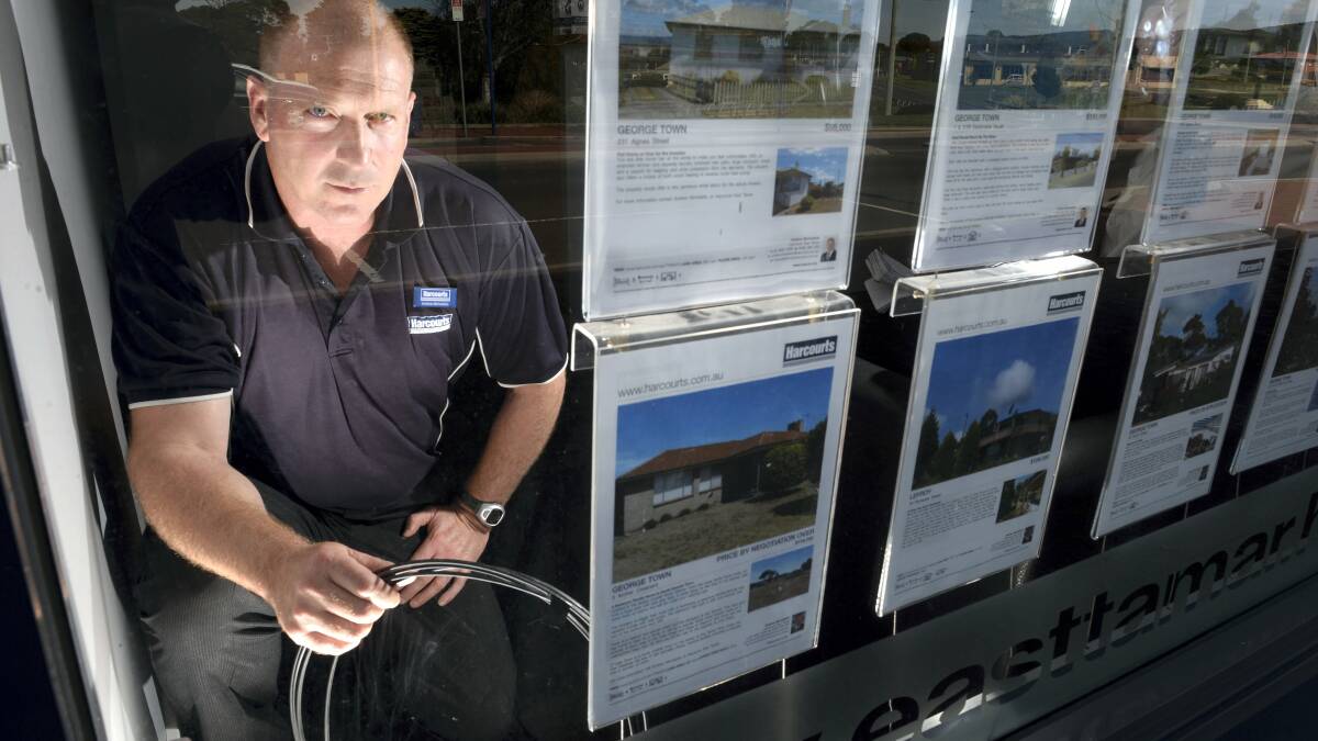 Harcourts East Tamar director Andrew Michieletto with cabling left unconnected for eight months.