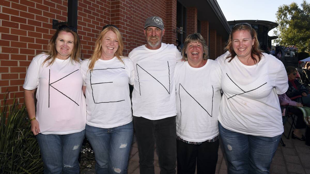 Heidi Johnston, Natalie Nadho, Daryl Smith, Sharon Richards and Rachel Goldfinch, all of Launceston, spell out their love for Kenny Rogers at yesterday’s  Tasmanian show.Pictures: MARK JESSER