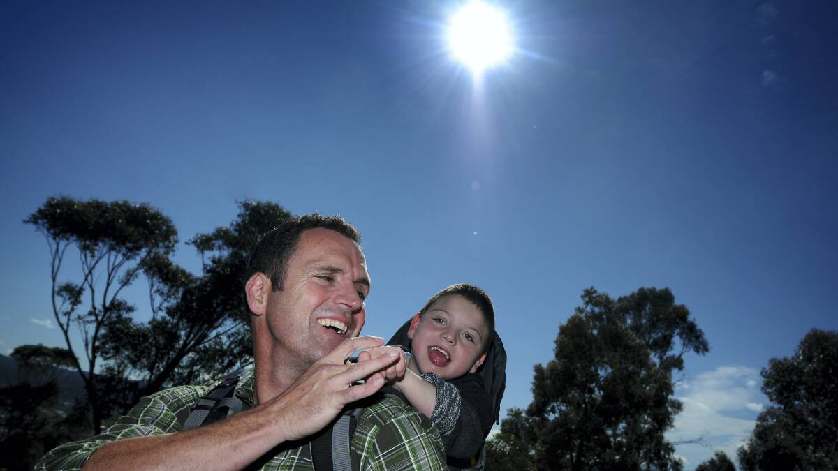 Chris Duffy and his son Jack are preparing to take on the Overland Track. Picture: GEOFF ROBSON