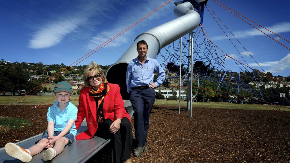 Tyler Bullock-Saunders, 4,  of Riverside, with West Tamar mayor Christina Holmdahl and West Tamar Parks and Reserves supervisor Jaimie Smith on the new play equipment at Tailrace Park. Picture: GEOFF ROBSON