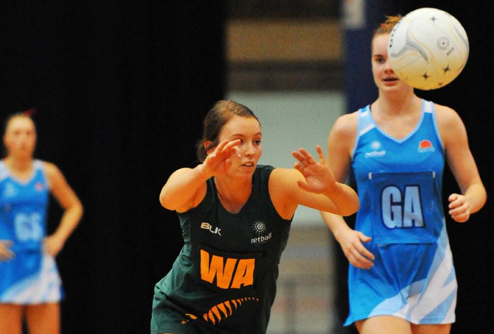 ON TRACK: Tasmanian Kelsie Rainbow in action for Tasmania at the Silverdome during the under-21 championships in March.