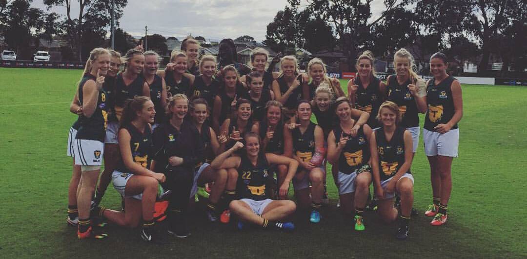 HISTORIC: Tasmanian girls celebrate their success over the Woomeras following the state's first win in the girls football. Picture: AFL Tasmania Facebook page