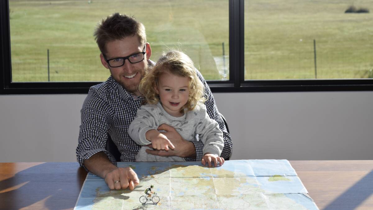 Island getaway: Wes Sulzberger and his son Max investigate possible cycling routes around Tasmania.