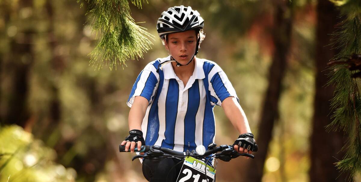 Eleanor McLean competing at the Tasmanian All Schools Mountain Bike Championships at Kate Reed Nature Recreation Area.