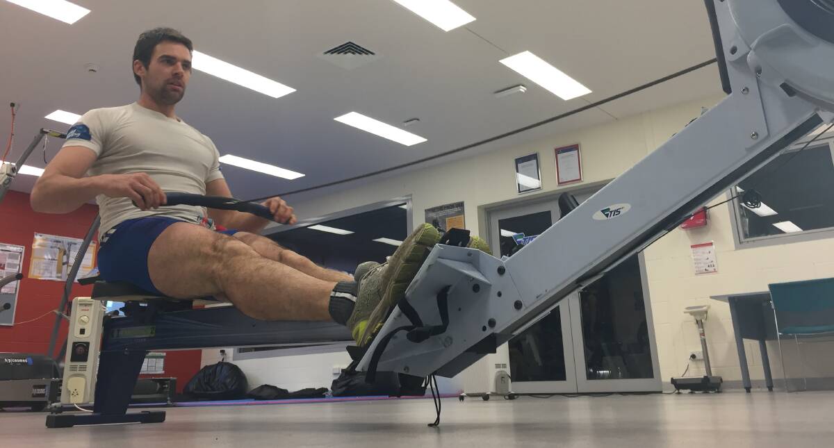 Looking ahead: Blair Tunevitsch hard at work in the Tasmanian Institute of Sport gym. Picture: Rob Shaw
