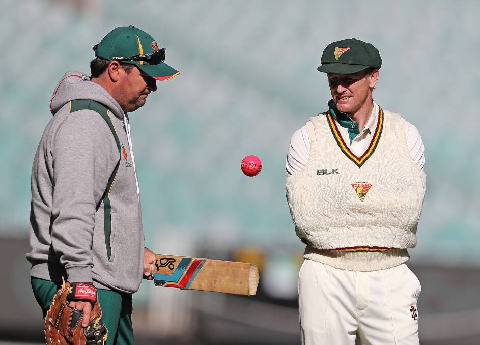 Bat men: Tasmanian coach Dan Marsh and captain George Bailey at the Sheffield Shield match against Victoria at the MCG. Picture: Getty Images