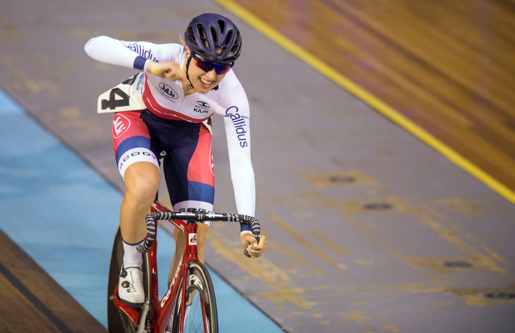 Taste of success: Chloe Moran celebrates her win in the women's wheel.