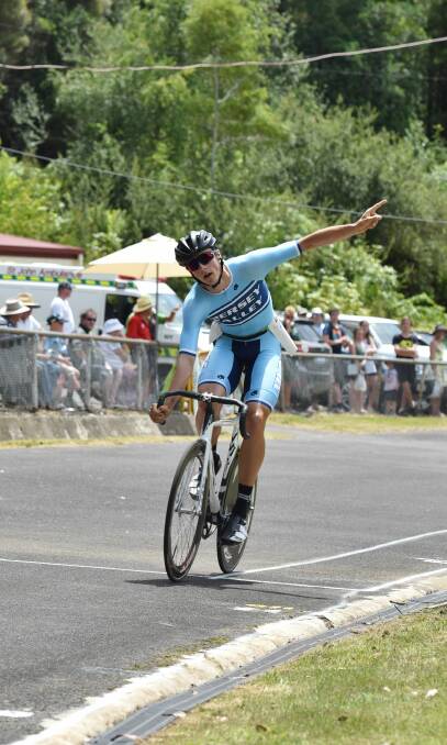 Victory salute: Michael Astell won the annual Launceston City Cycling Club race from Deloraine to Launceston.