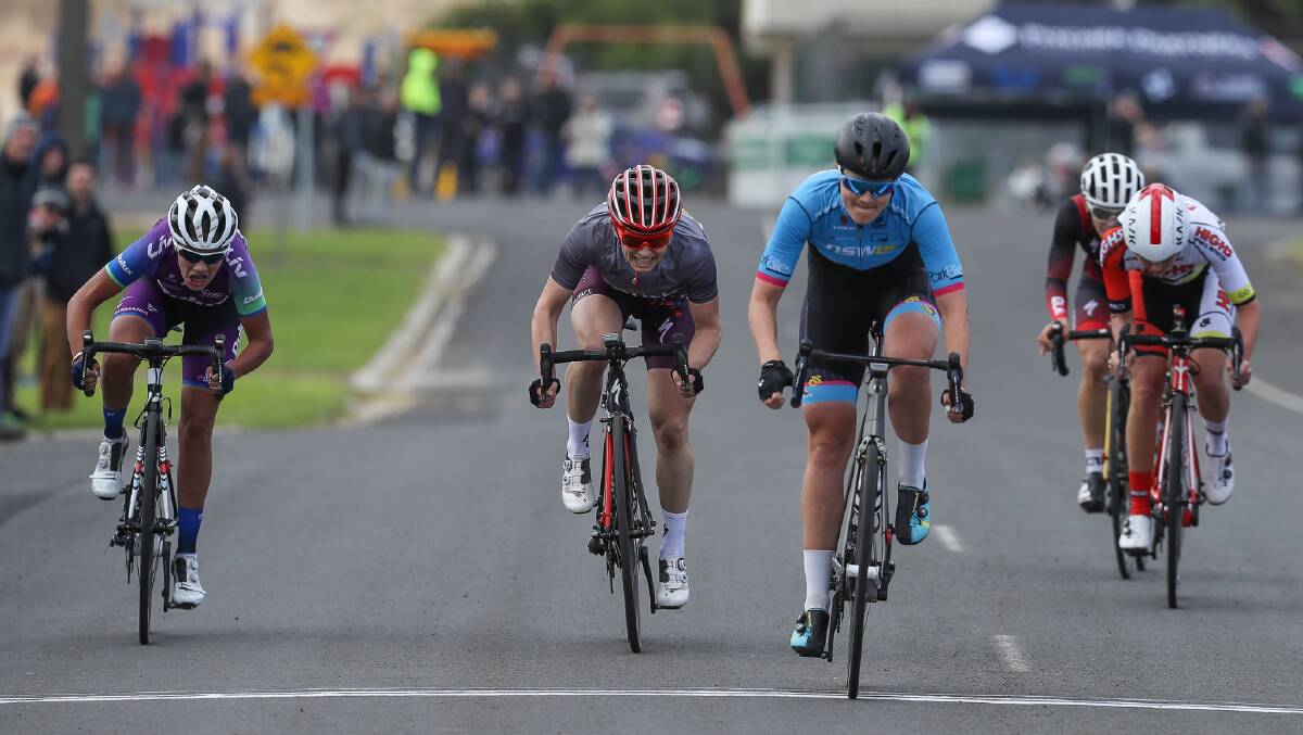 Peterborough united: Tasmanian Anya Louw sprints to third place behind stage winner Ash Ankudinoff. Picture: Con Chronis