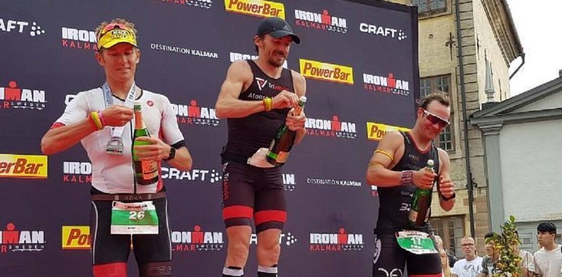 Cam Wurf (left) on the podium in Sweden.