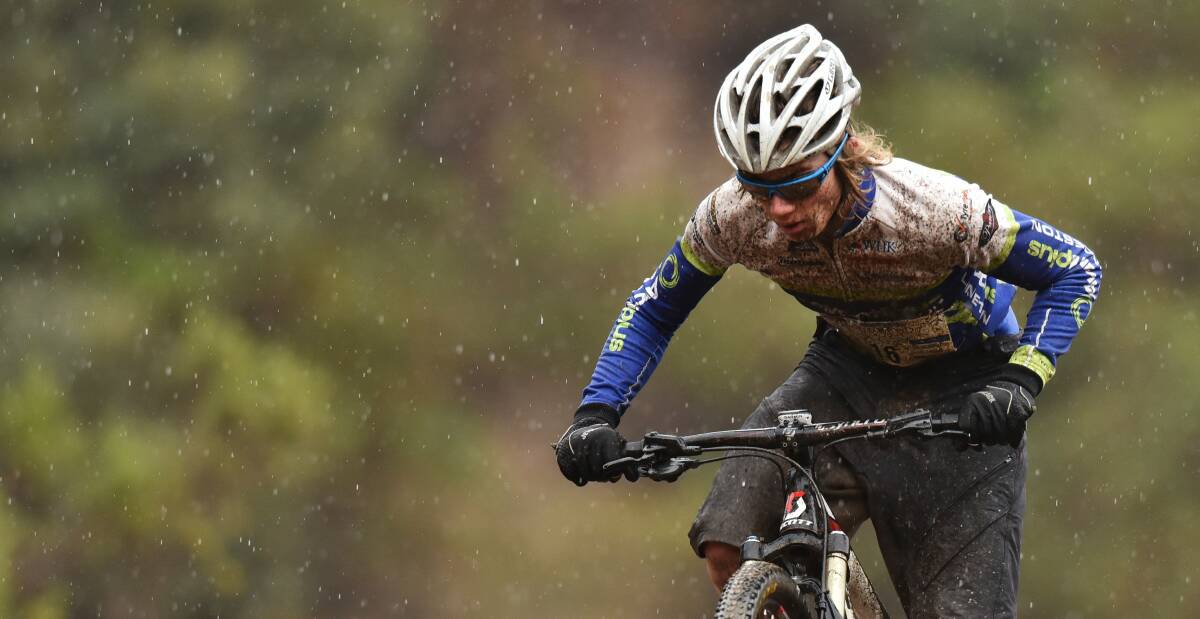 Mud guard: Ferrier on the mountain bike leg of the 2015 Ben Lomond Descent.