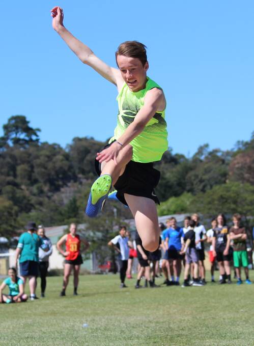 High flier: Grade 8 Sam Talbot leaps for the skies in the long jump at the Kings Meadows High School athletics carnival.