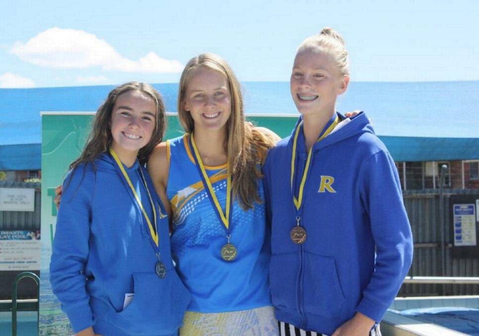 Clean sweep #3: Riverside Aquatic's Jessica Shaw, Olivia Jeffrey and Hannah Lenthall shared the podium in the 14 girls' 100m breaststroke. Pictures: Ted Cooper