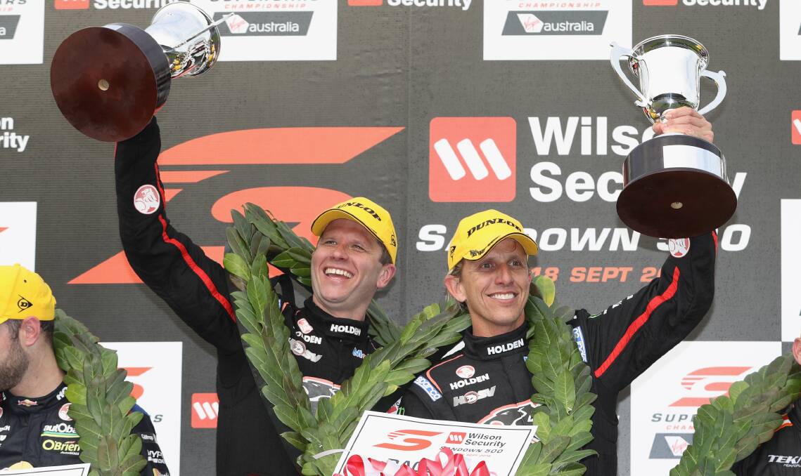 WINNING SMILES: Garth Tander and Warren Luff, of Holden Racing Team, celebrate after winning the Sandown 500. Tander has a lot to prove after the decision not to renew his contract for 2017. Picture: Getty Images
